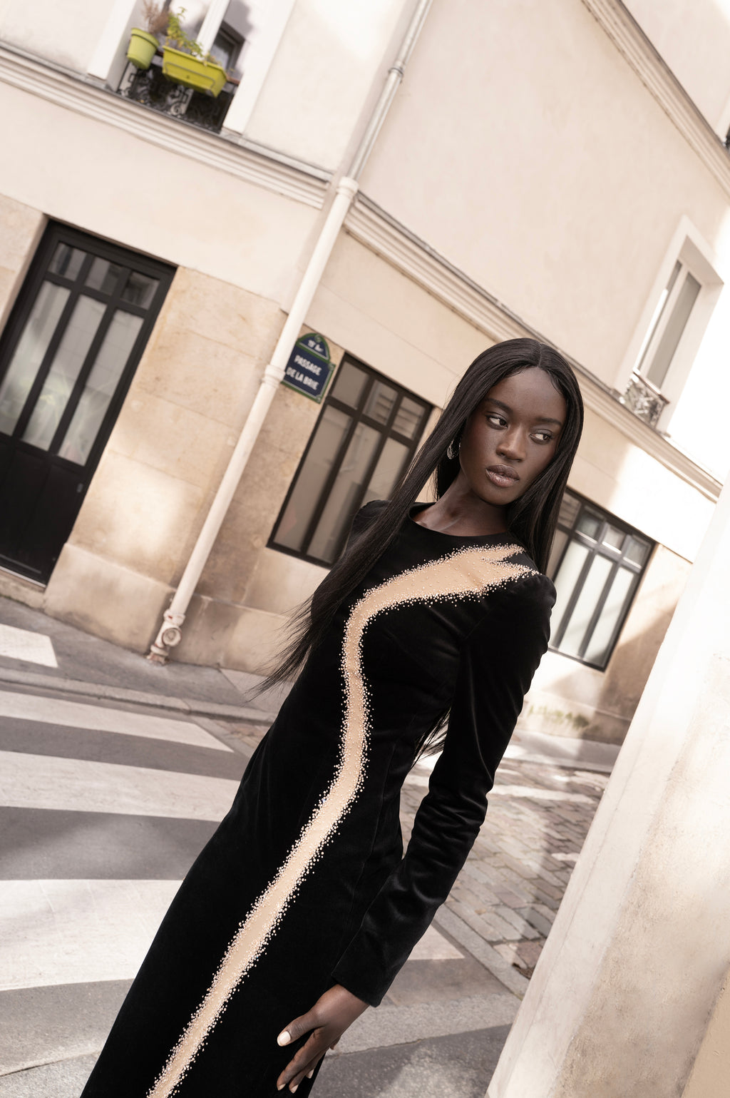 Velvet Black Dress with Line Sketch Embroidery black velvet gown three-quarter view on model