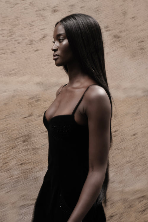 Blake Long Dress black floor-length gown side detail on model