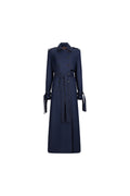 A navy blue double-breasted trench coat with a matching waist tie belt, displayed on a clean white background.