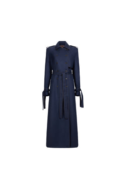 A navy blue double-breasted trench coat with a matching waist tie belt, displayed on a clean white background.