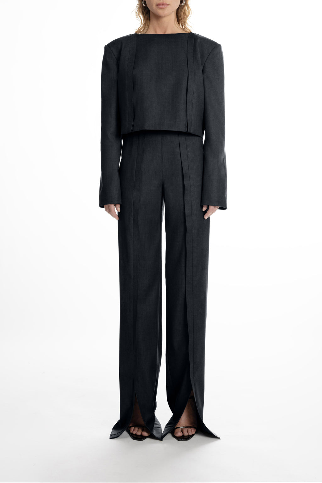 Black Placket Trousers with Slits - tailored 100% wool, clean placket and subtle front slits for modern movemen