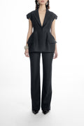 Women’s black hip-length blazer with sharp lapels and cap sleeves