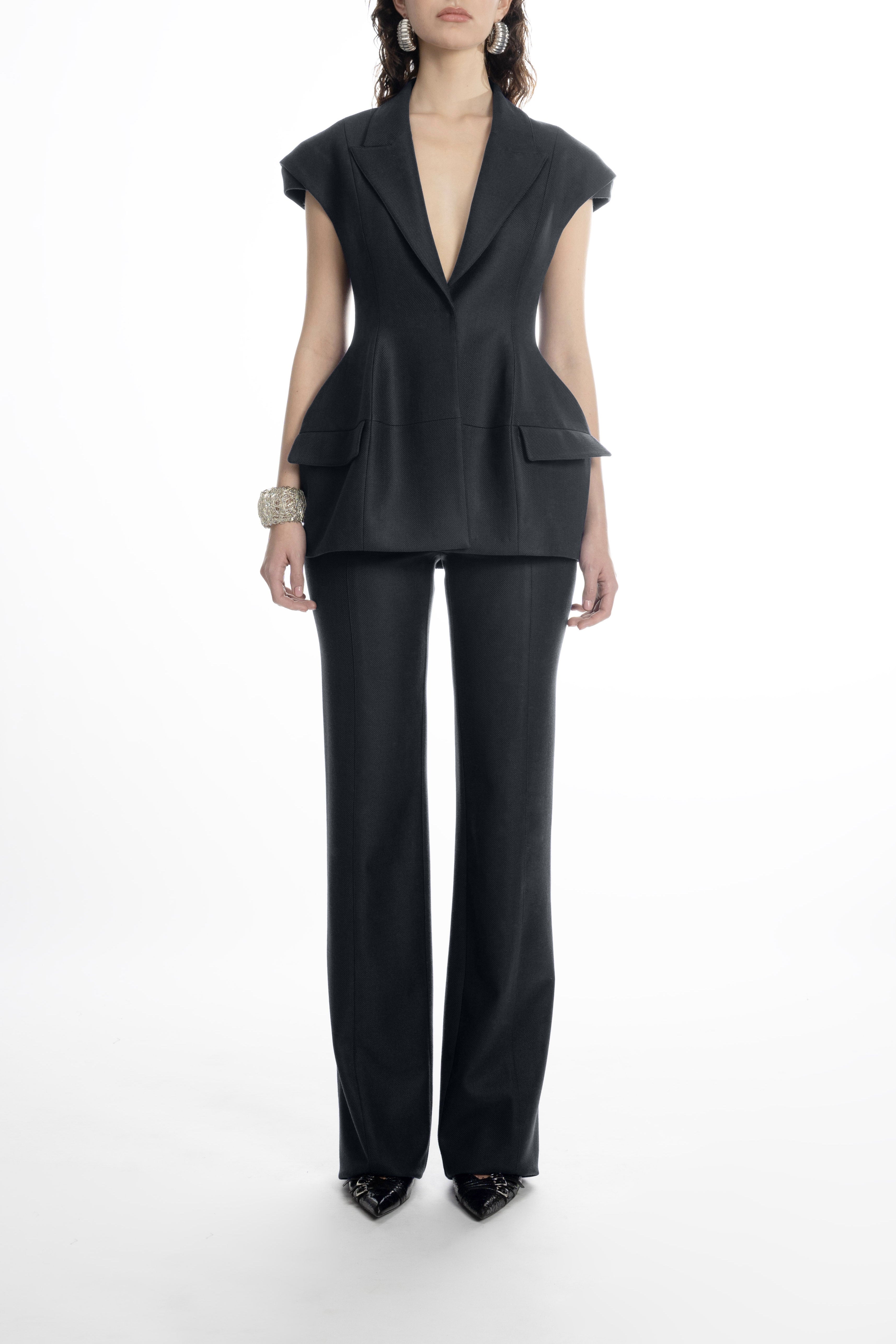 Women’s black hip-length blazer with sharp lapels and cap sleeves