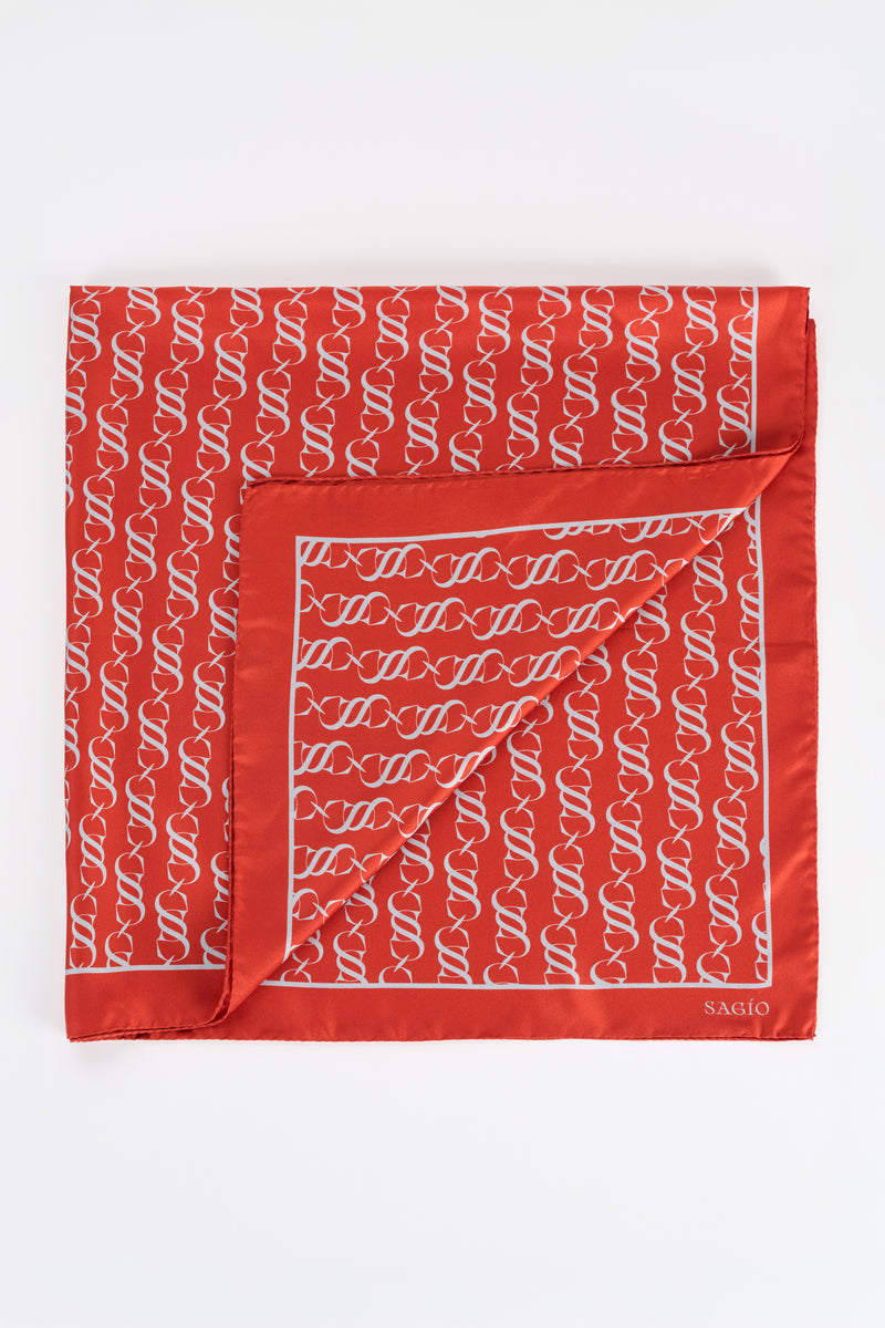 Vermilion red twill silk Grand Carré scarf with white monogram print and border detail