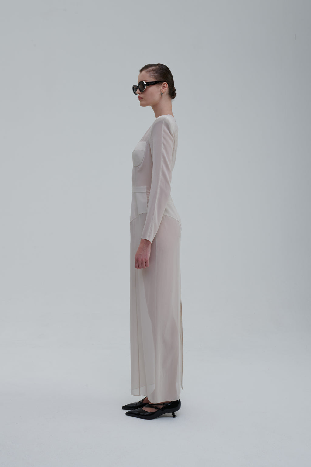 Underwear Application Dress in ivory sheer silk, side view showing bustier cups and long sleeves