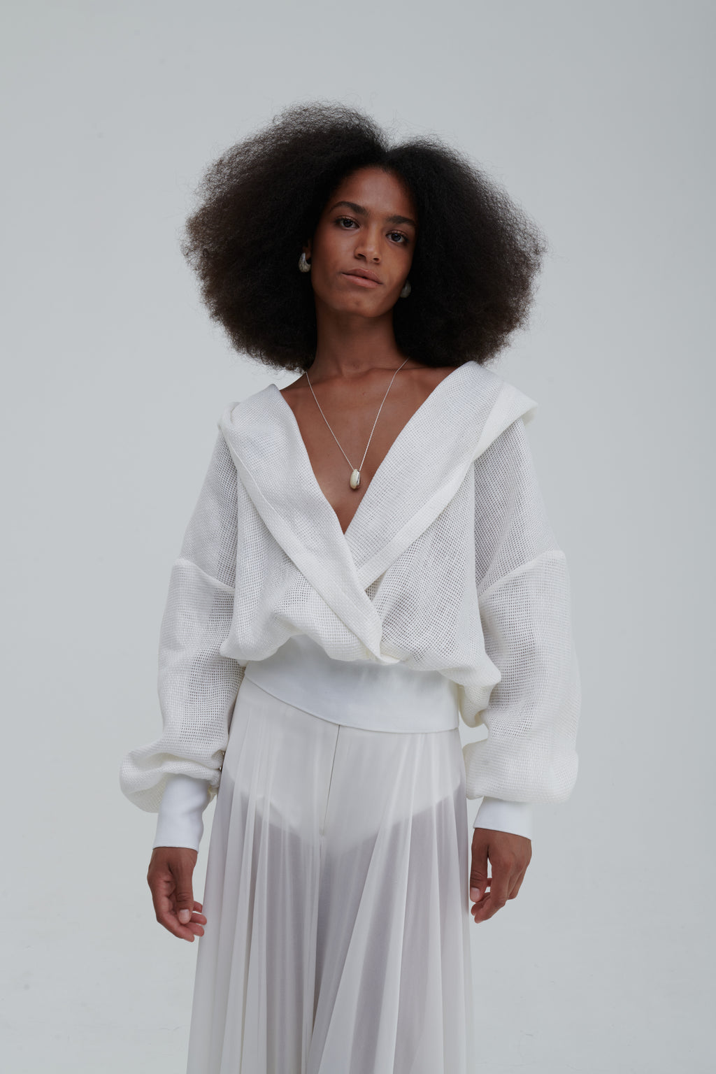 Half-body front detail, deep V neckline and crossover front in mesh