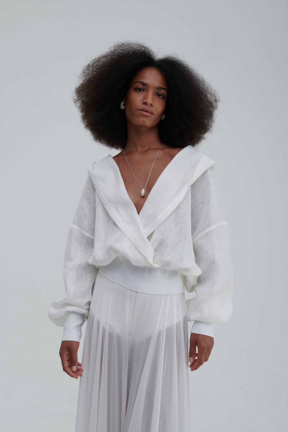 Half-body front detail, deep V neckline and crossover front in mesh