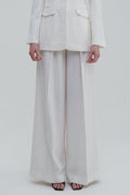 White classic palazzo trousers detail, front lower view with wide-leg drape