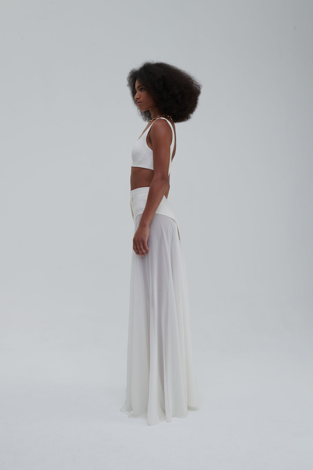MAXI UNDERWEAR APPLICATION SKIRT by Sagio from the Spring/Summer 2025 collection — a sheer white maxi skirt featuring underwear-inspired paneling and elegant draping. Conceptual designer fashion in lightweight fabric from thesagio.com