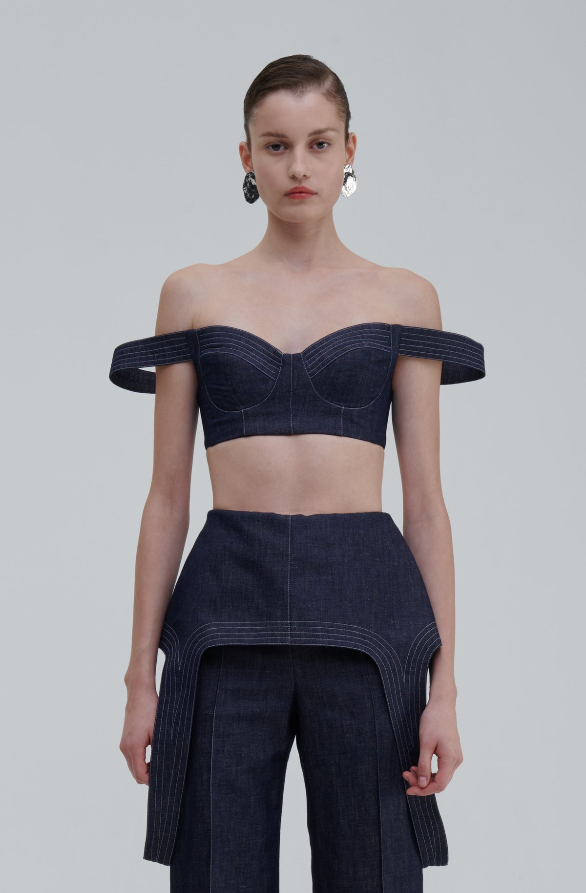 Dark indigo denim falling top with sculpted bustier fit, front view