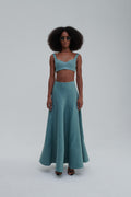 Green Bay linen maxi skirt with quilted hem, front view on-model